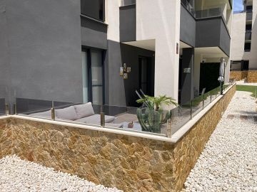 MAGNIFIQUE APPARTEMENT AU REZ-DE-CHAUSSÉE À LOS ALTOS - ORIHUELA COSTA - AT HOME Real Estate